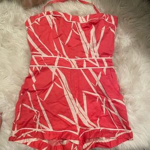 Romper once piece zipper back new with out tags coral Halter.